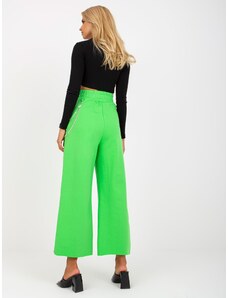 Fashionhunters Light green wide sweatpants with holes