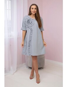 Kesi Dress with a decorative flower of gray color