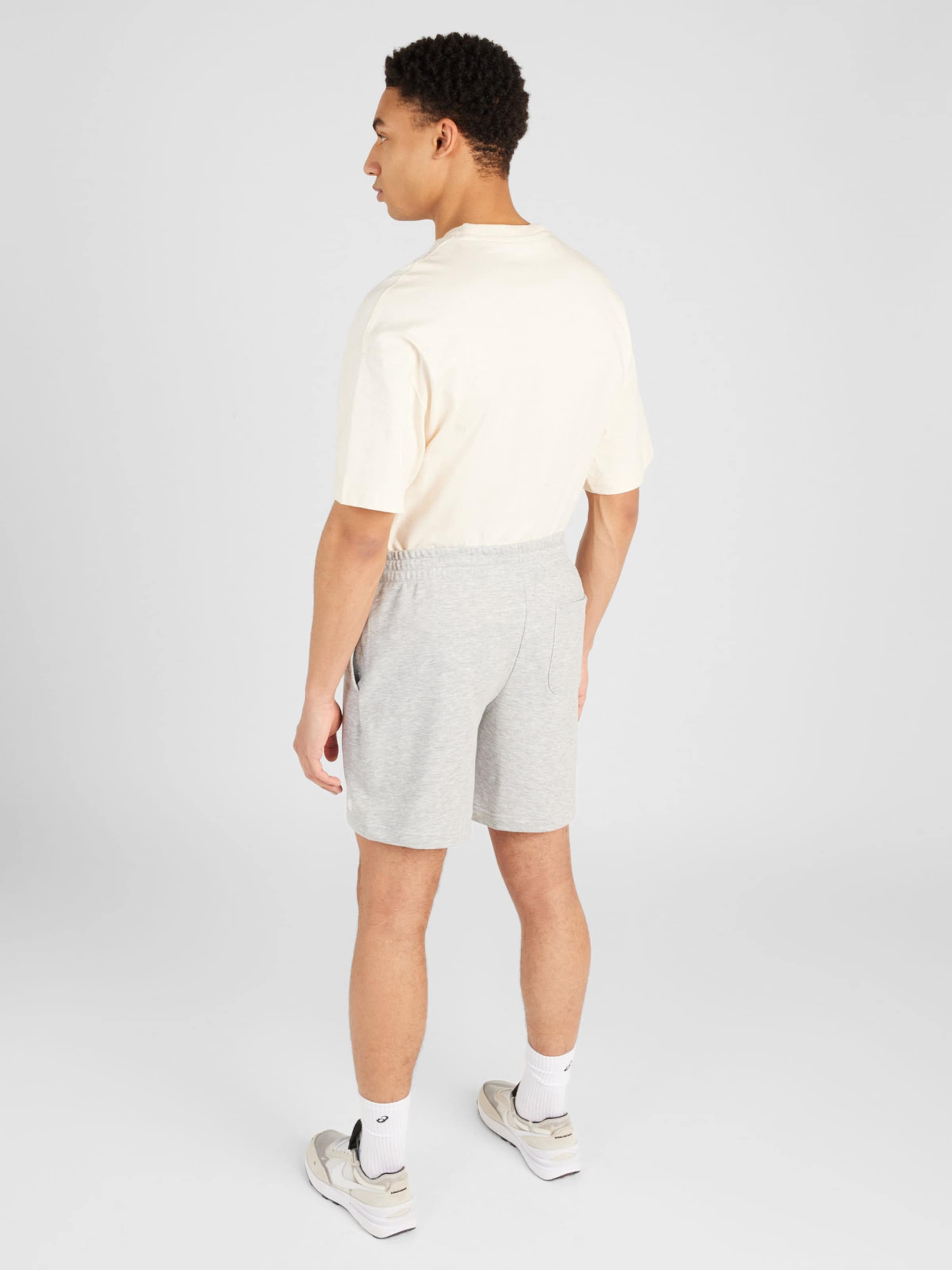 new balance Nadrág 'Essentials' szürke melír / fehér