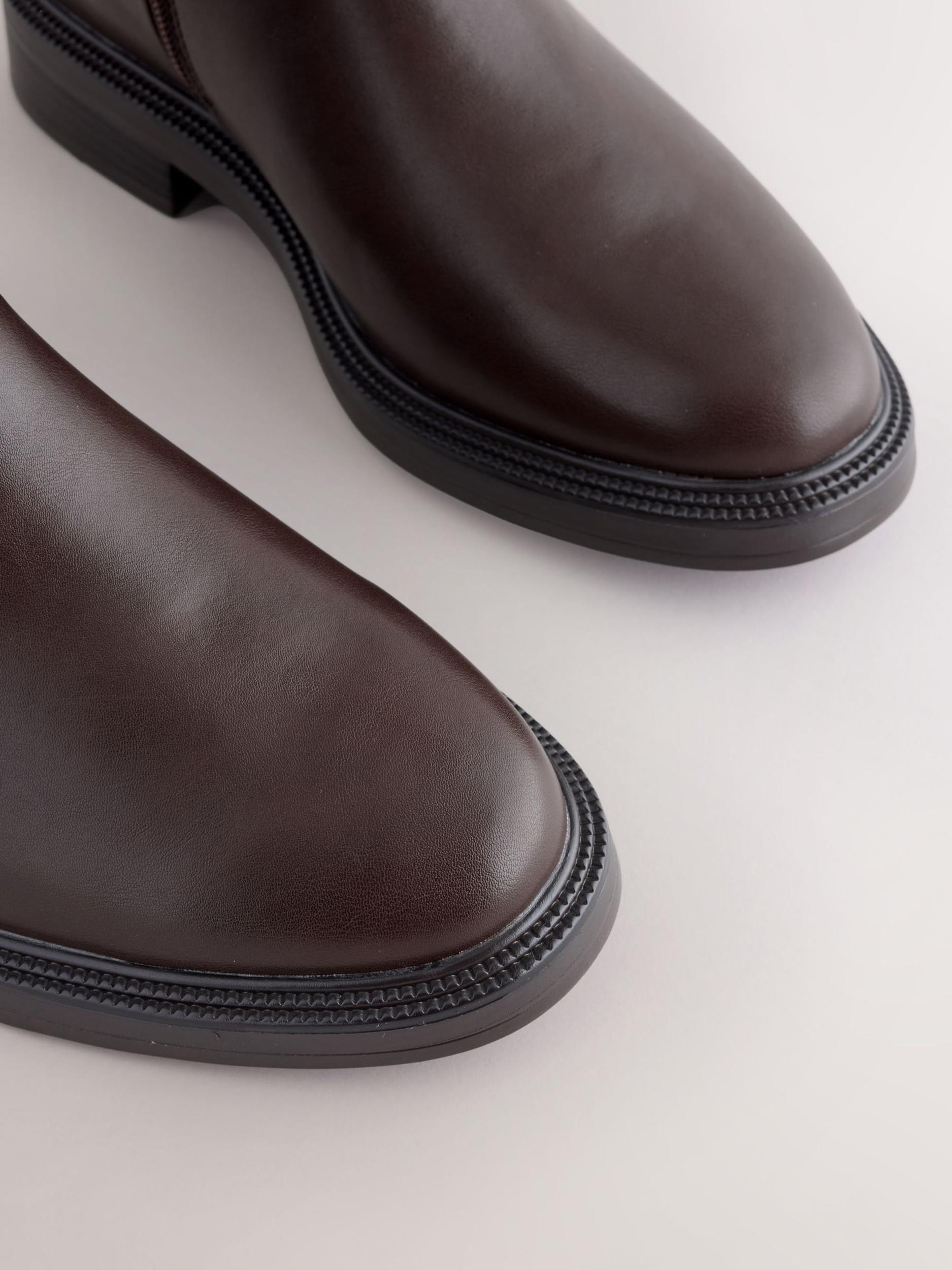 Next Rövid szárú csizmák sötét barna