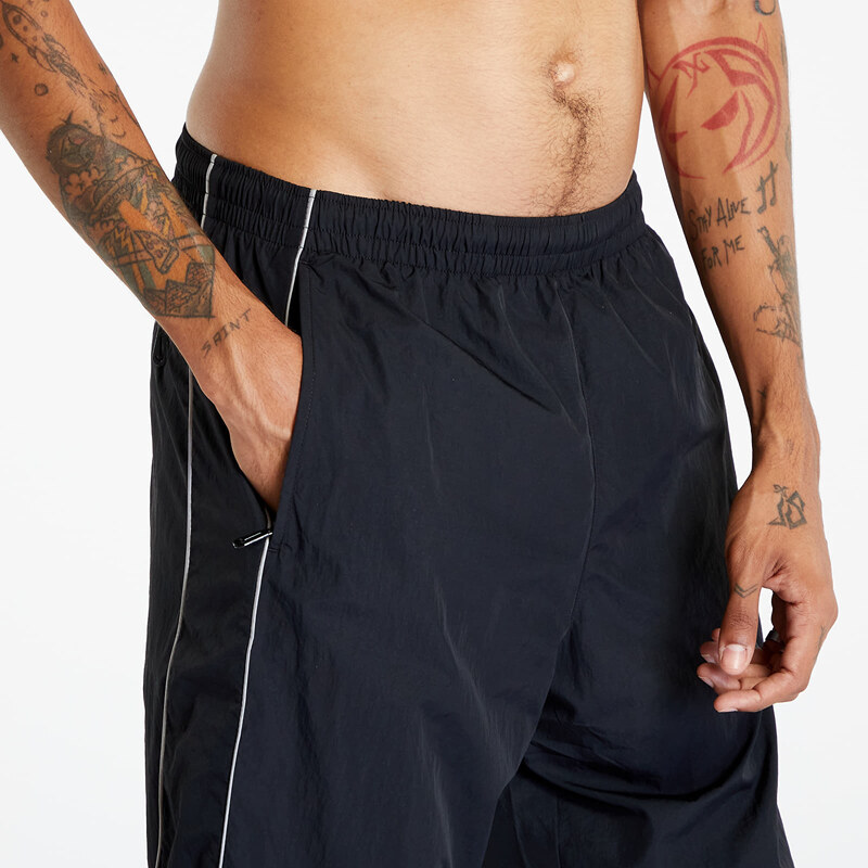 Férfi susogós nadrágok Nike Solo Swoosh Men's Track Pant Black/ White