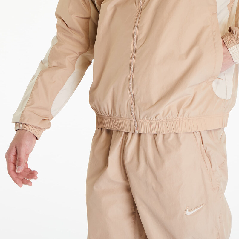 Férfi kabát Nike x NOCTA Men's Woven Track Jacket Hemp/ Sanddrift/ Sanddrift